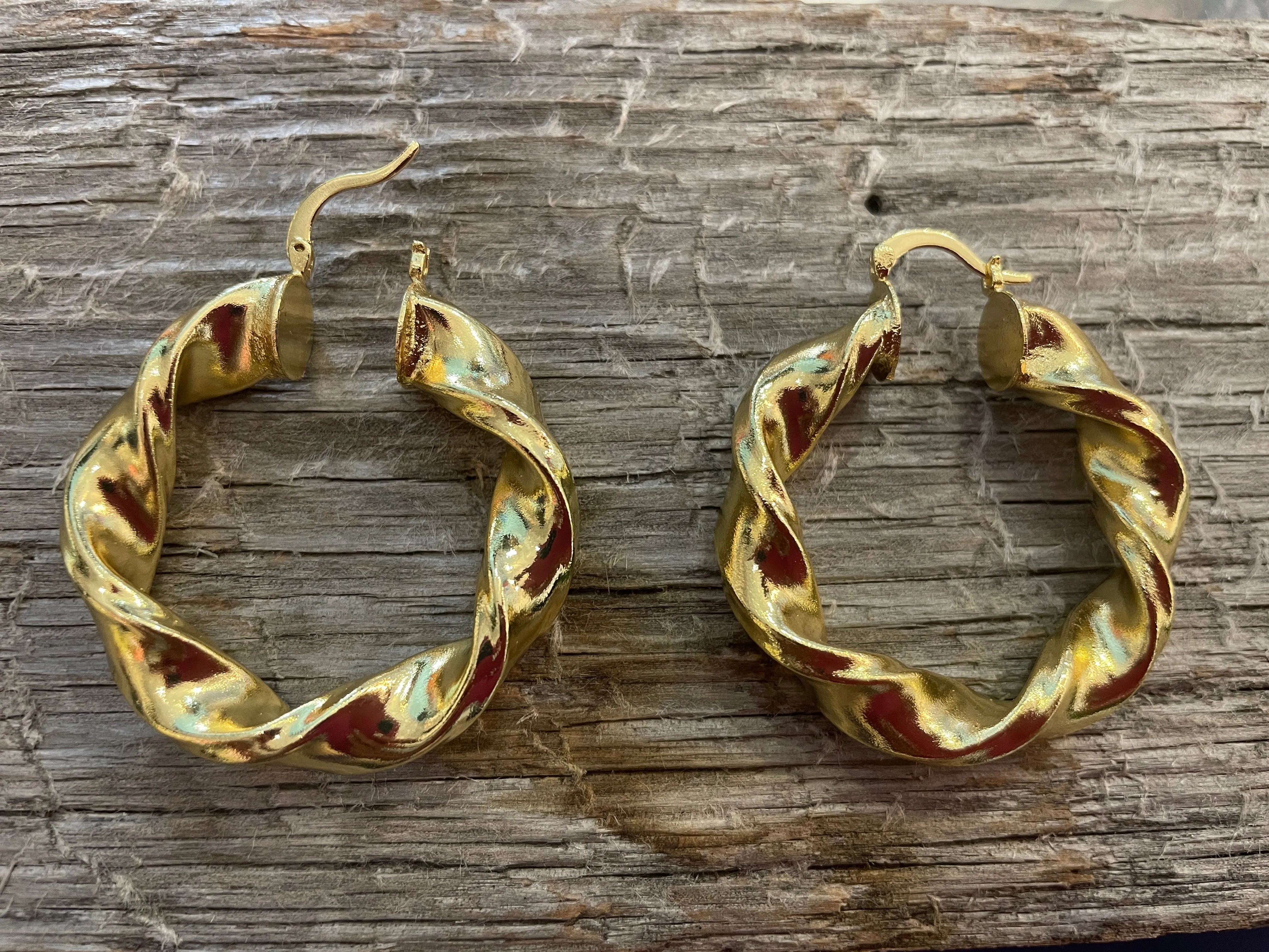 Large twisted lightweight gold hoops